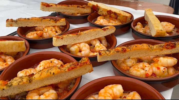 shrimp dish with foccacia on top